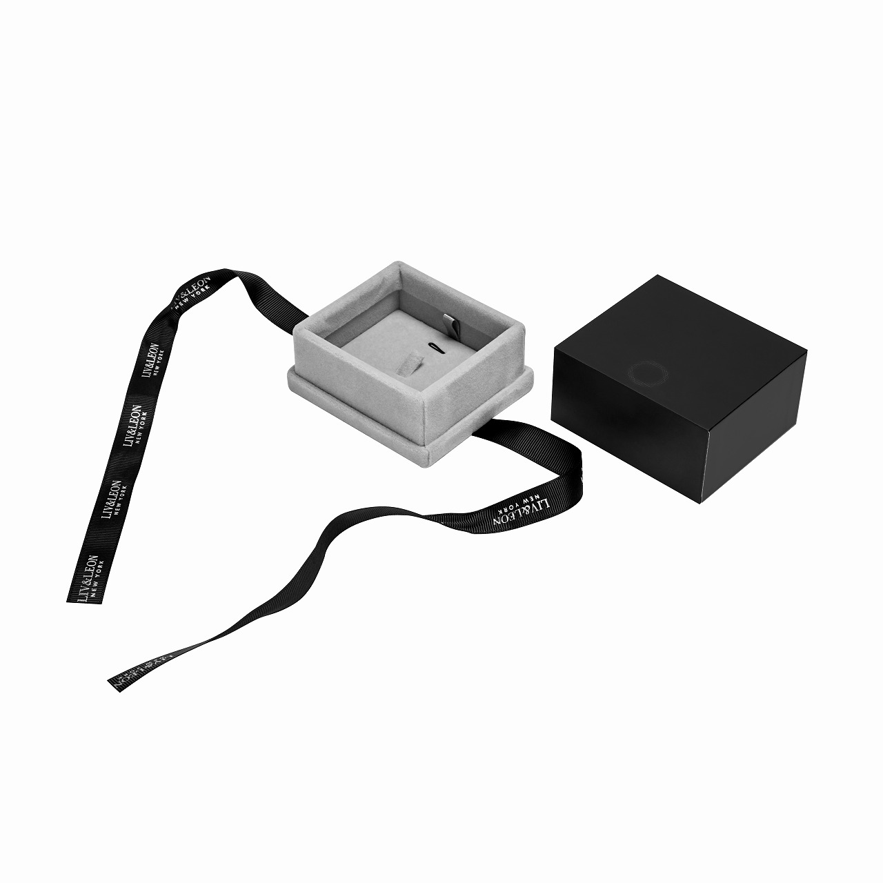 Custom jewelry box with velvet padded base and logo ribbon Custom jewelry box with velvet padded base and logo ribbon